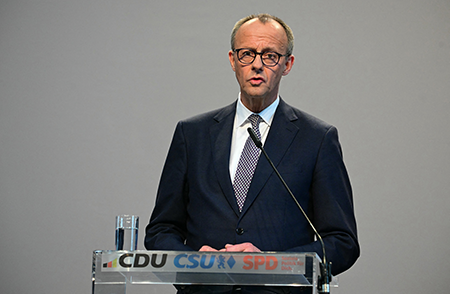 The incoming German chancellor, Friedrich Merz, addresses journalists after reaching an agreement to form a new government April 9 in Berlin. In the face of U.S. President Donald Trump’s increasing favoritism toward Russia, Merz has advocated discussions with France and the United Kingdom on nuclear sharing. (Photo by Tobias Schwarz/AFP via Getty Images)